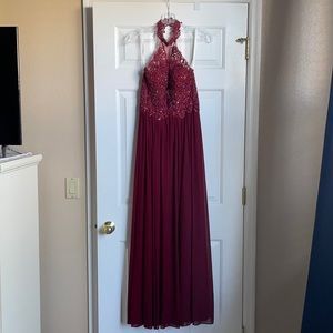 Burgundy prom dress from CC’s boutique
